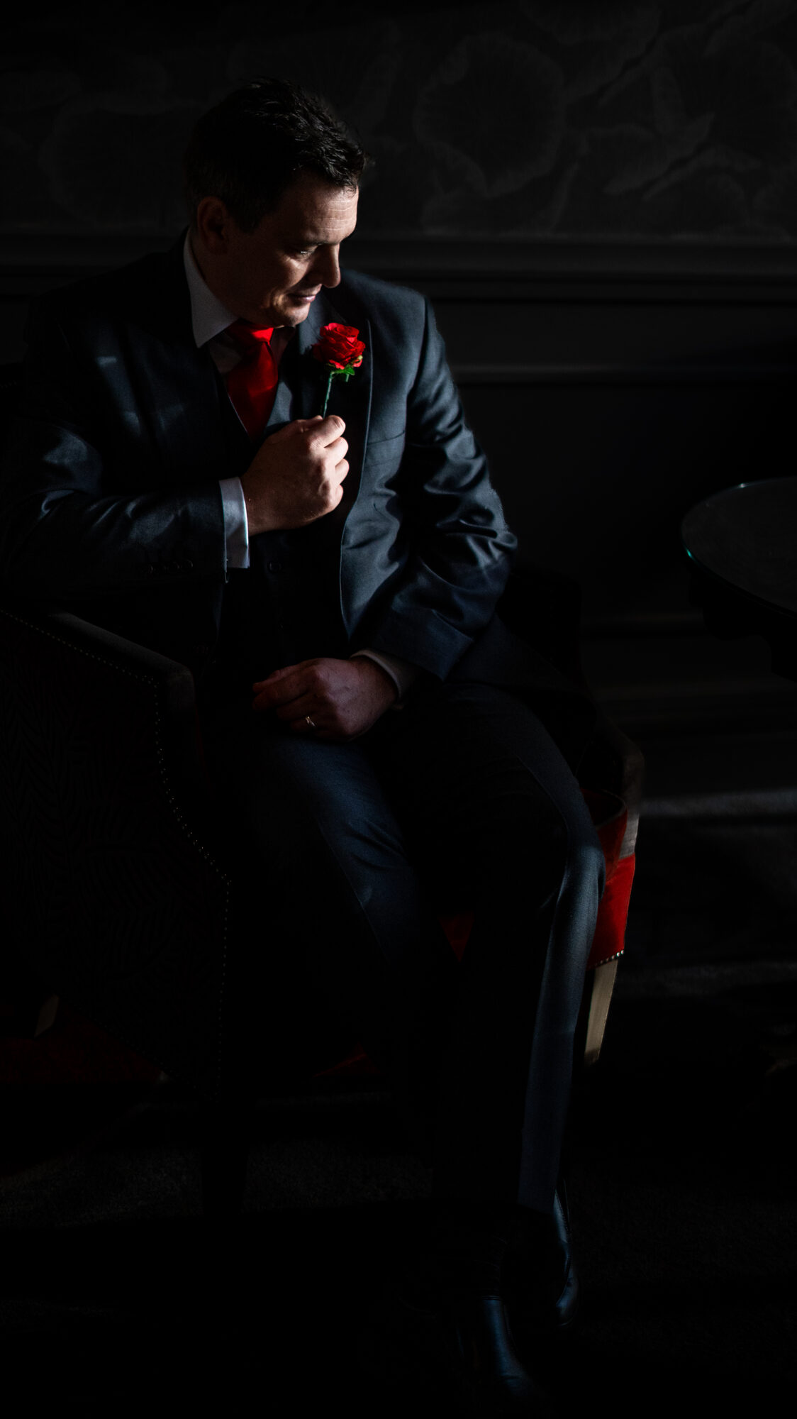Groom with rose