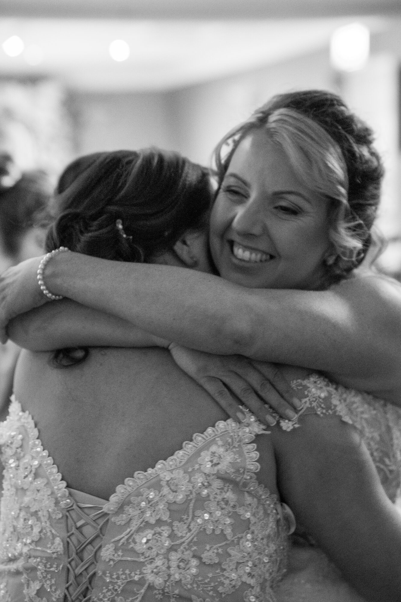 Brides embracing black and white